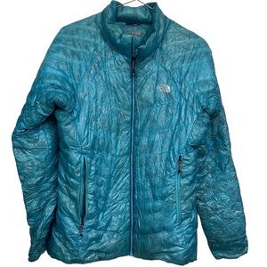 The North Face blue Summit Series down winter jacket. Size Medium